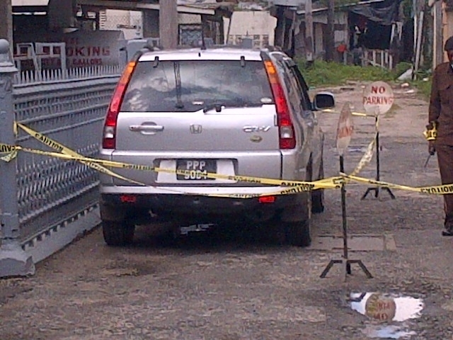 Suspect in homicide-heist held