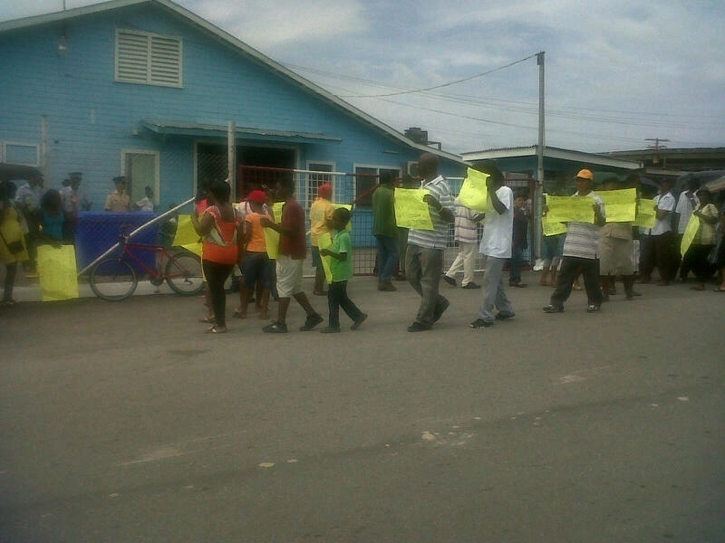 Transport Minister meets with residents near CJIA airport, others protest outside