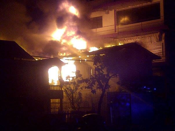 Updated: Fire guts Fullworks Auto building; woman rescued from back house