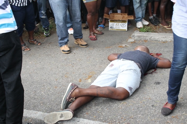 Updated: Bandit shot dead shortly after snatching bag of cash