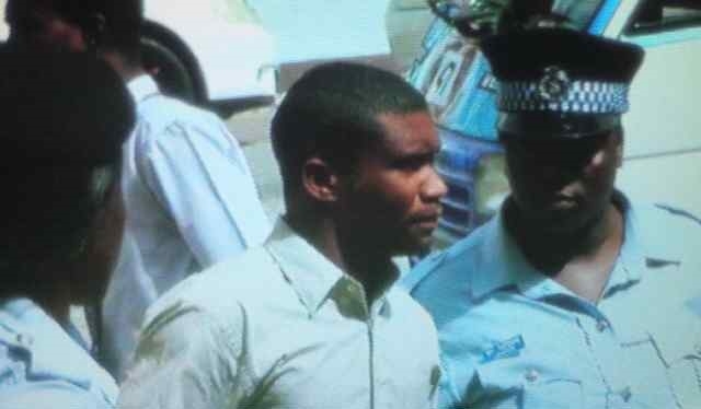 Church’s Chicken employee behind bars for allegedly killing boy