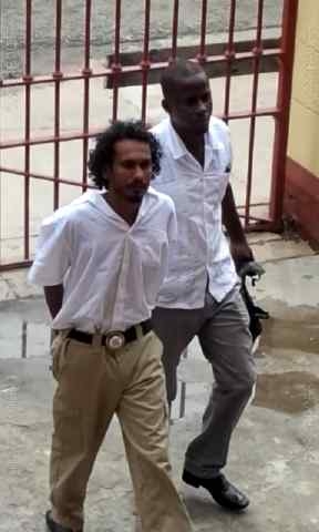 Man arraigned for killing wife in bucket