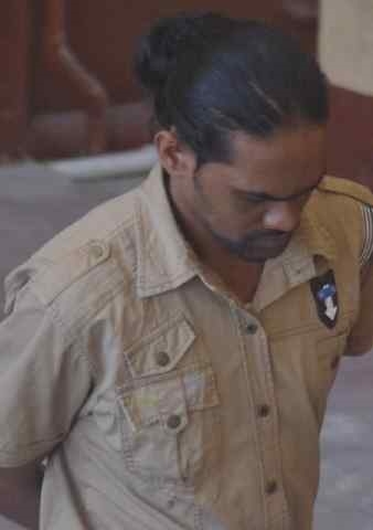 Man charged with beating his mother for money