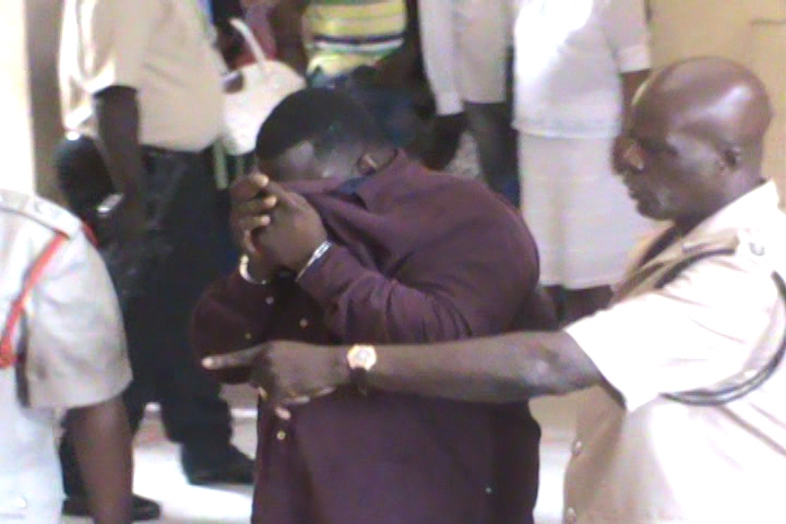 Man arraigned for gunning down city businessman’s wife