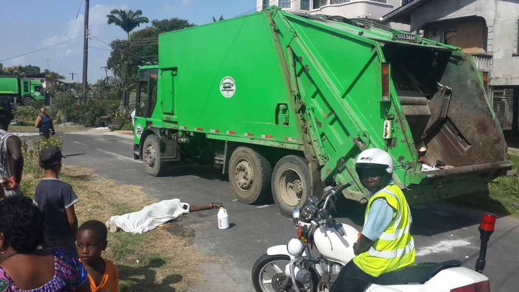 Waste disposal truck crushes porter