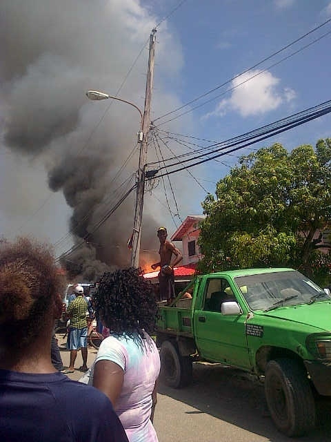 Woman burnt to death, two buildings destroyed