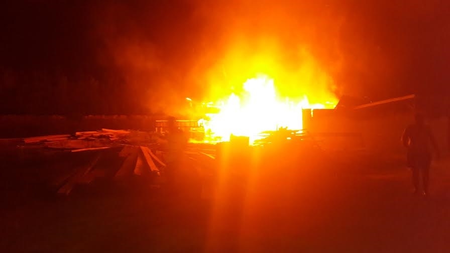 Arsonists burn furniture factory and lumber yard