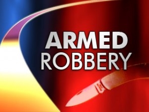 Travel agent robbed shortly after returning from overseas