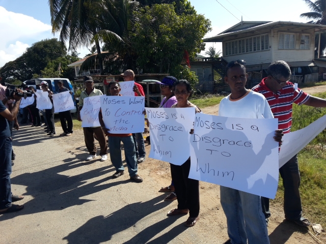 Opposition protesters greet PM Nagamootoo at Whim village