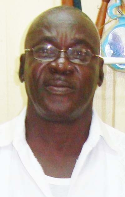 Director of Prisons charged with sexual assault, steps down from post