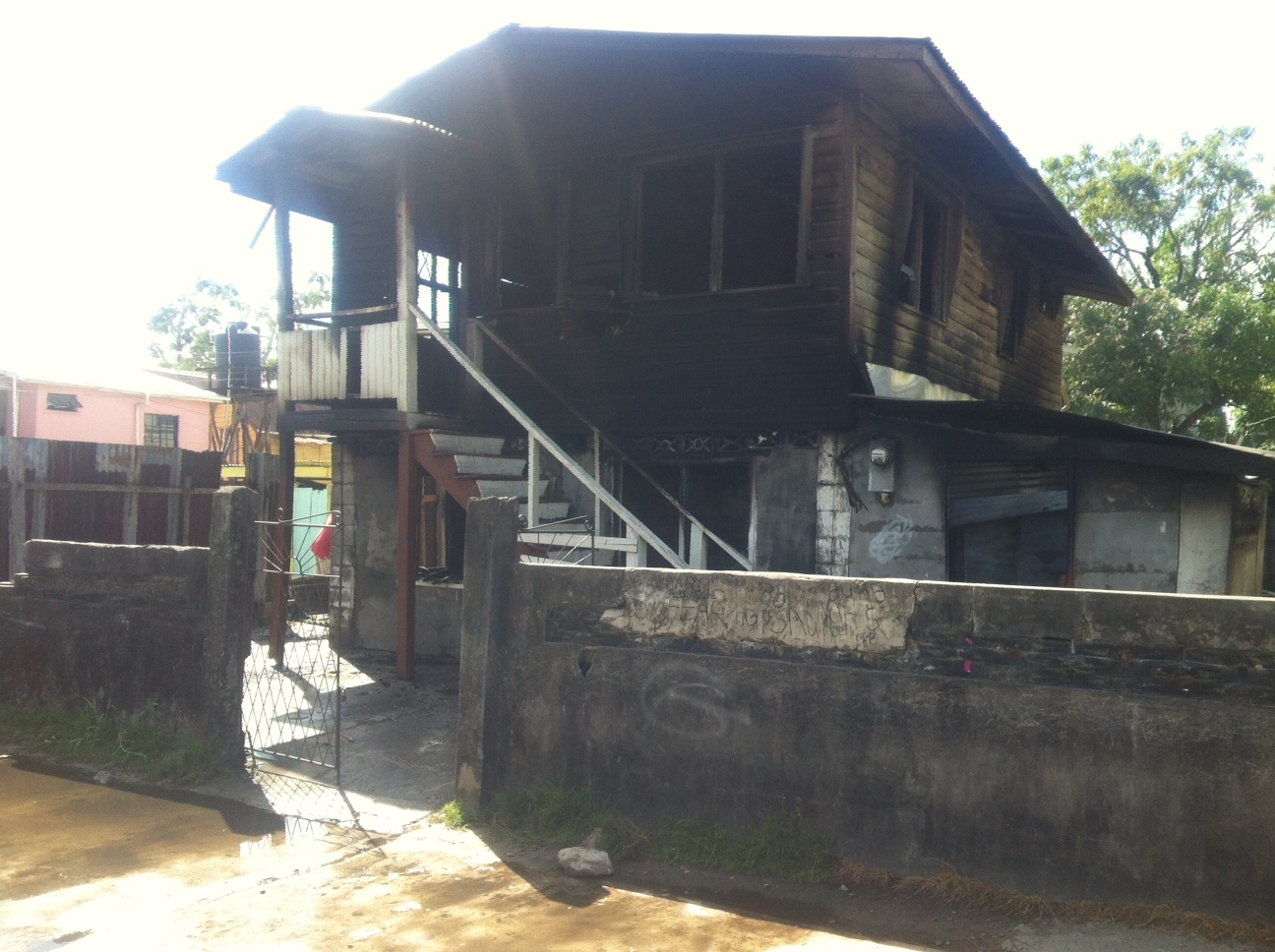 House torched after wanted man shot dead