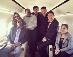 Minister of State, Joseph Harmon (seated left), Chairman of the Guyana Civil Aviation Larry London (standing second from left) and top officials of Baishan Lin in an aircraft in China. Seated (at extreme right) is a Guyana government official.