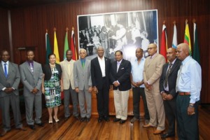 Minister of Communities, Ronald Bulkan; President David Granger and Prime Minister Moses Nagamootoo with the recently-elected mayors of Guyana's nine towns.