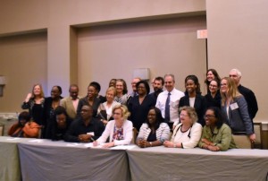  Junior Minister of Public Health,  Dr. Karen Cummings (seated third from right) with participants at PEPFAR meeting held recently in Florida.