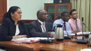 Minister of Foreign Affairs, Carl Greenidge (centre) flanked by technical officers at the Foreign Relations Sectoral Committee meeting that examined the status of the Guyana-Brazil Partial Scope Agreement.