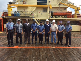 Members of the GDF Coast Guard and Edison Chouest Offshore LLC officials.