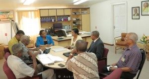 NCN's Chief Executive Officer, Lennox Cornette in jacket, accompanied by Human Resources Manager, Tishika De Costa and Programme Manager, Ron Robinson meeting with the two Ministers responsible for Labour and other top officials of the Department of Labour.