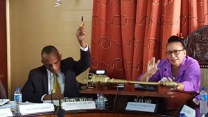 Deputy Mayor, Sherod Duncan raised his hand to respond to an announcement by City Mayor, Patricia Chase-Green (next to him) who refused to entertain any discussions.