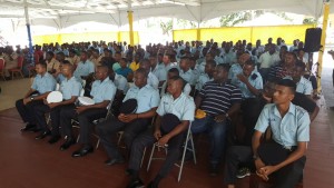 Members of the Traffic and Anti-Crime Patrols listening to an address by Police Commissioner, David Ramnarine.