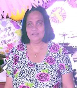 14-year old, adult charged with murder of businesswoman