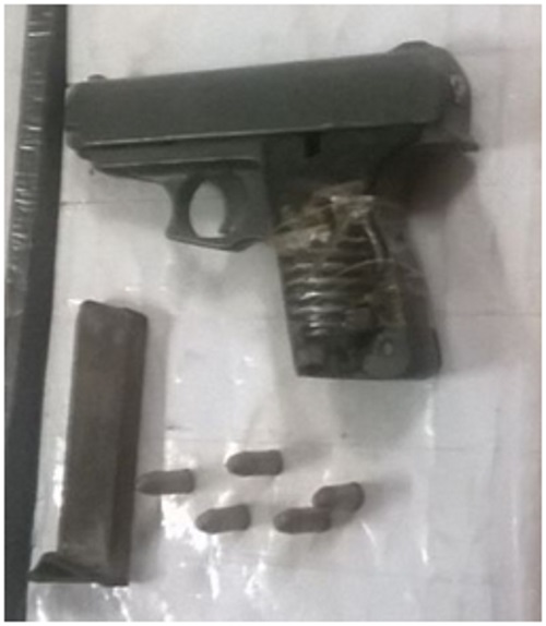 Robbery suspect held allegedly with gun, ammo