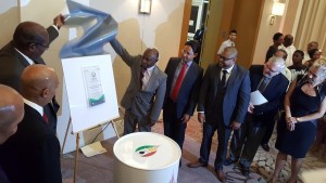 Foreign Affairs Minister, Carl Greenidge and GOGA Director, Nigel Hughes unveil the association's logo at Marriott Hotel.