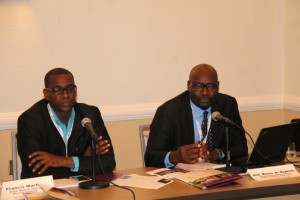 Senior Medical Officer of Grenada’s Ministry of Health, Dr Francis Martin (left) and St. Lucian parliamentarian, Moses Jn, Baptiste. 