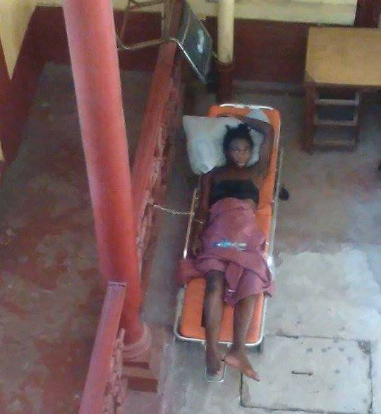 Shot robbery suspect taken to court on stretcher