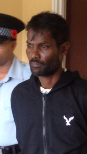 Corentyne labourer charged with hacking woman to death
