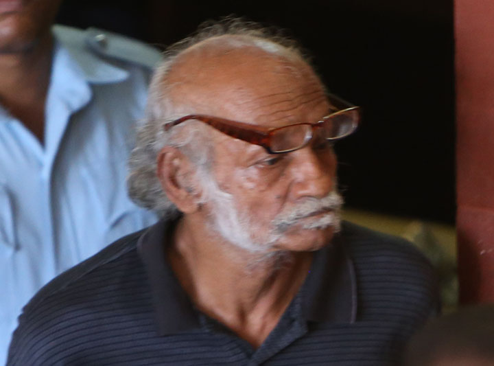 Ruling looms for businessman, accomplice charged in triple murder