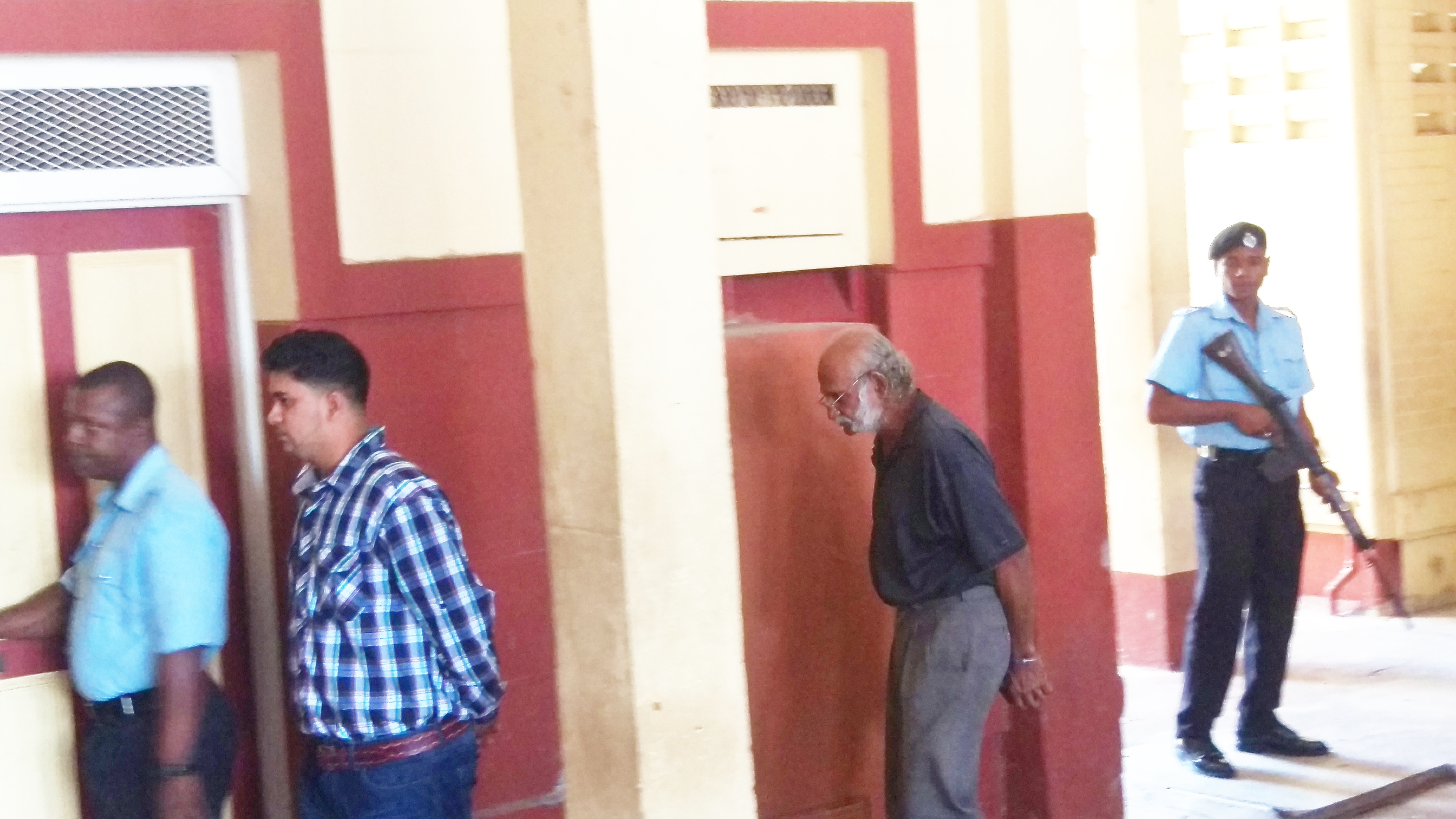 City businessman, employee to stand trial for triple murder in Robb Street fire