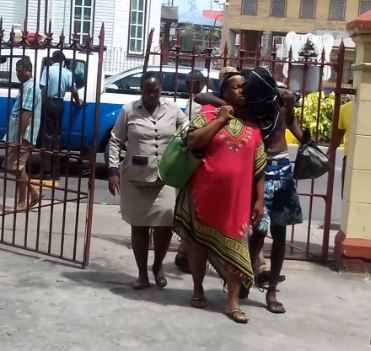 Mother, son charged with gun, ammo, ganja offences