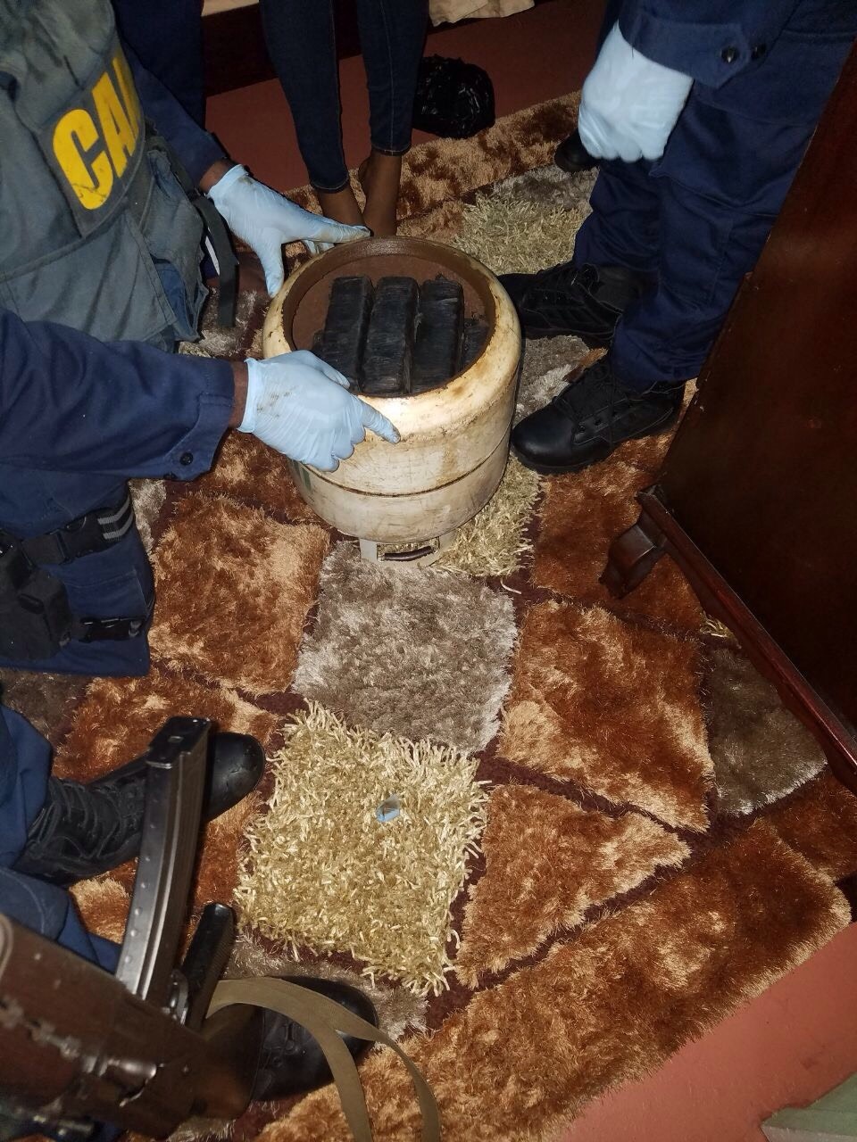 Teens arrested for suspected cocaine in gas cylinder