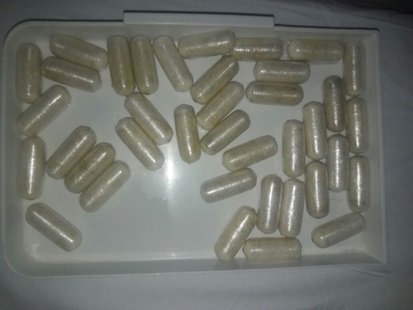 Canada-bound man excretes suspected cocaine pellets