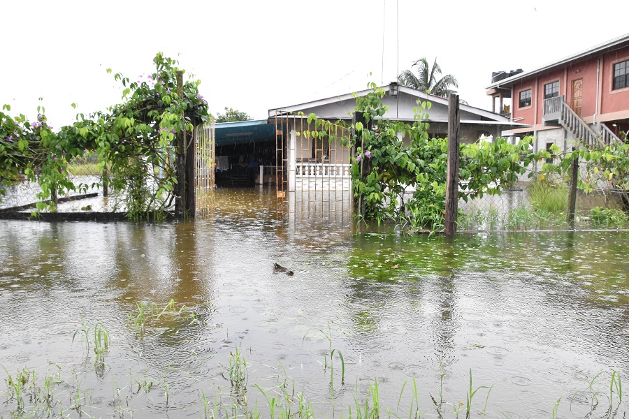 West Bank Demerara residents get flood clean-up support; drainage system being cleaned