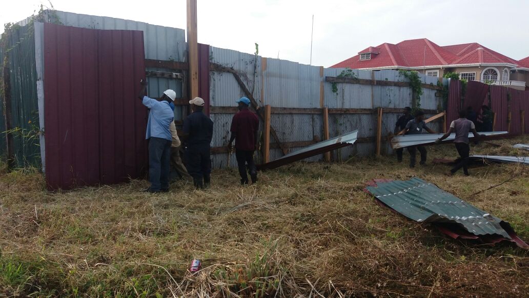 GWI begins breaking down fence it says encroaches on Lama Canal reserve