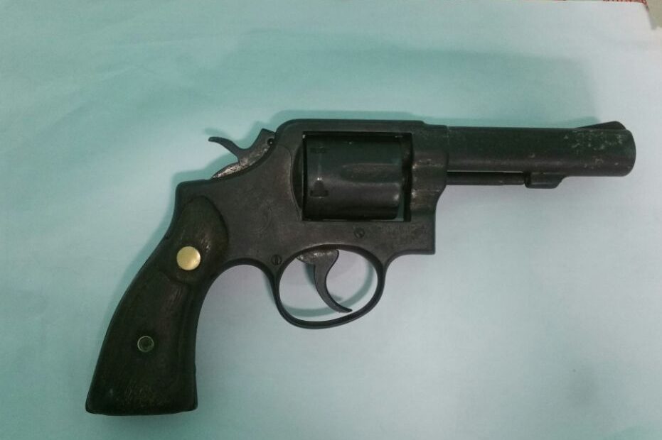 Policemen among several arrested after unlicensed gun found nearby