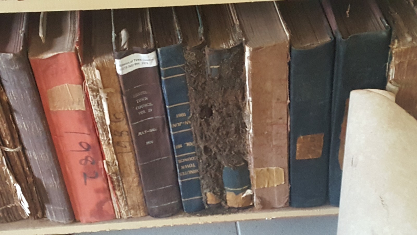 19th Century historical records of Georgetown poorly stored in a room at dilapidated Constabulary Training School