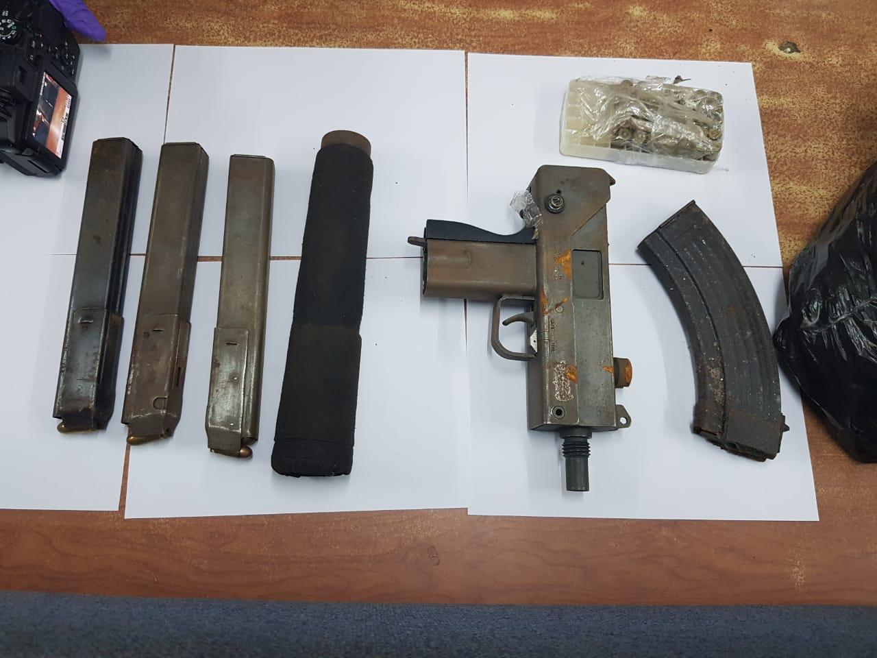 7 arrested; gun, ammo, silencer seized