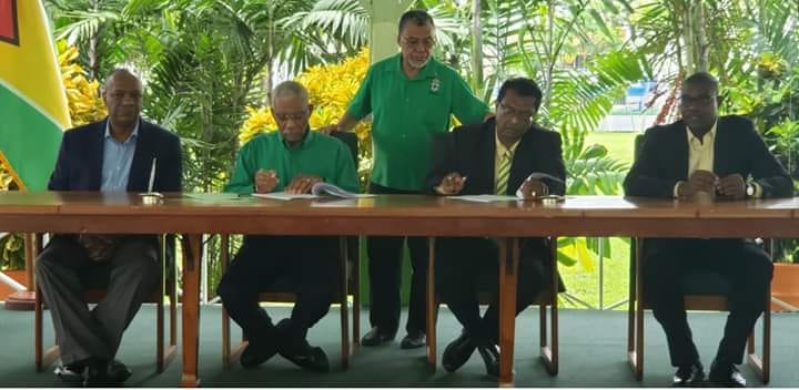 APNU, AFC sign revised political agreement secretly