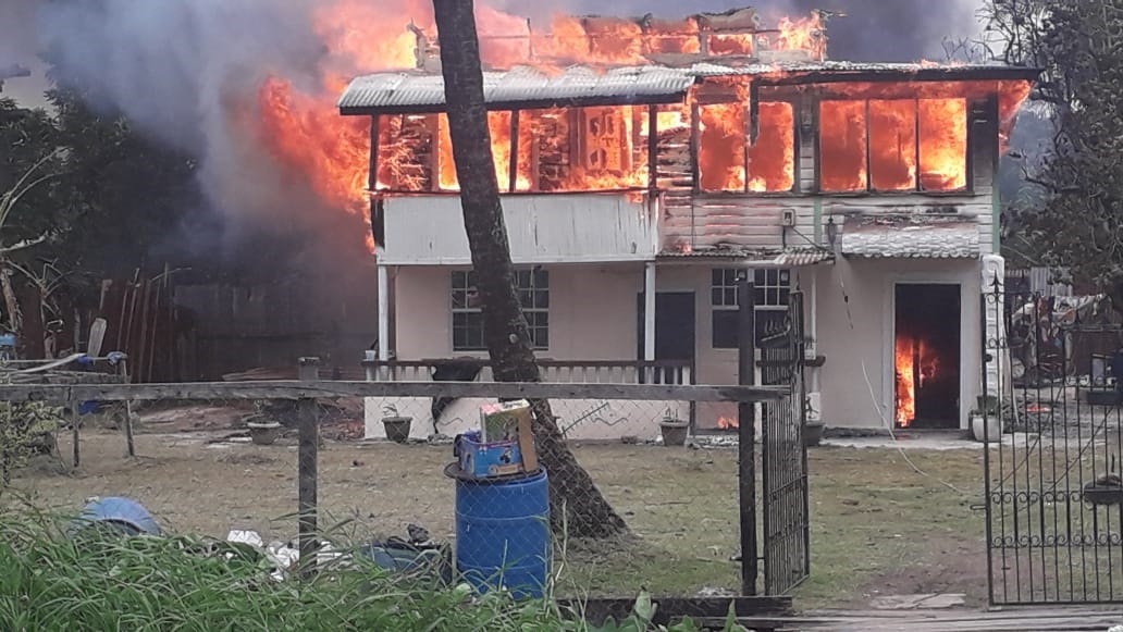 Fire destroys house occupied by 11 persons