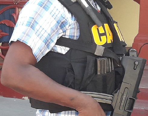 Scrap metal shipment transited Guadeloupe before arriving cocaine-laden in Belgium; Guyanese shipper wanted