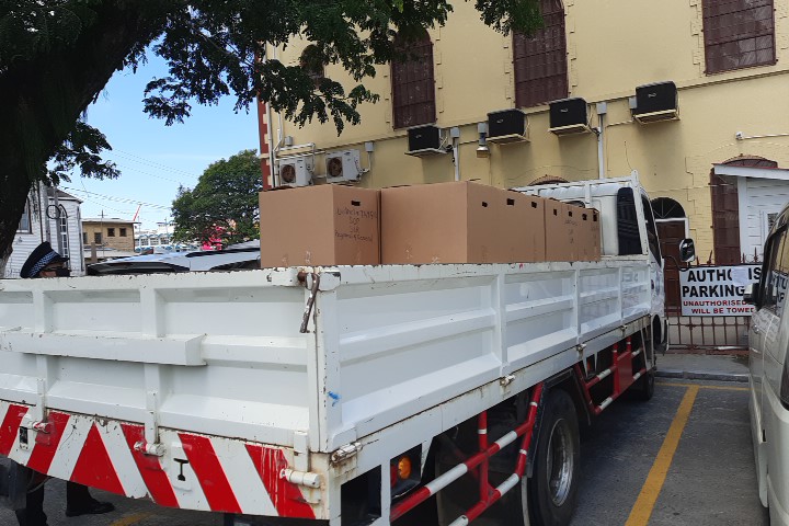 Prosecution presents truckload of evidence to Magistrates’ Court; concerns raised about security