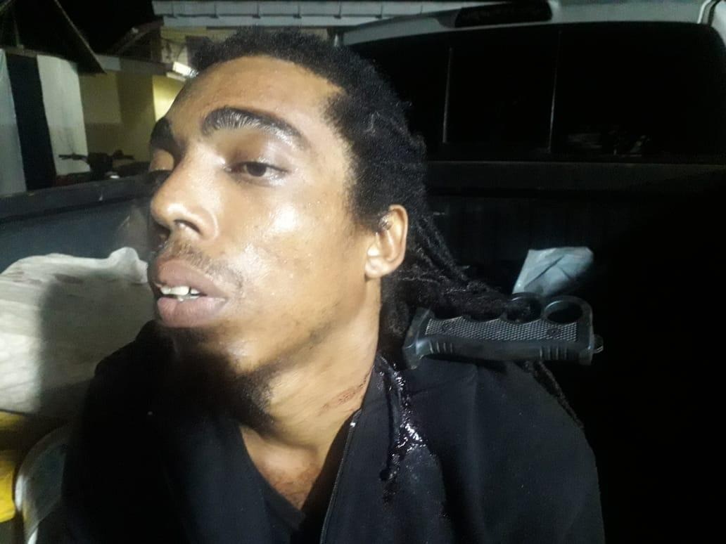 Convicted killer recaptured with knife in neck one year after escaping from prison