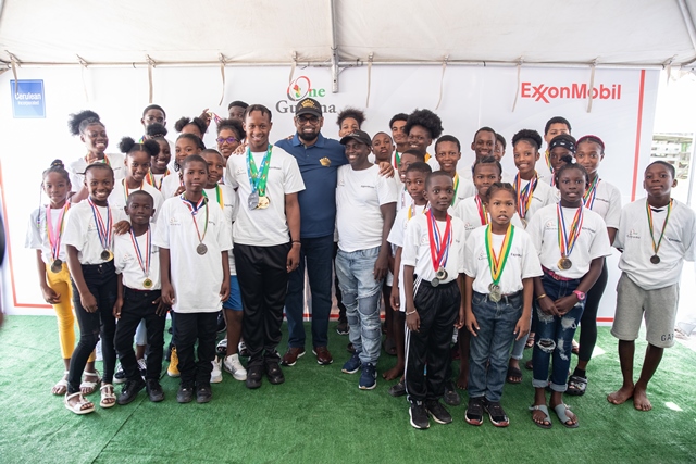 Buxton youths get upgraded playground; GY$1 million pledge