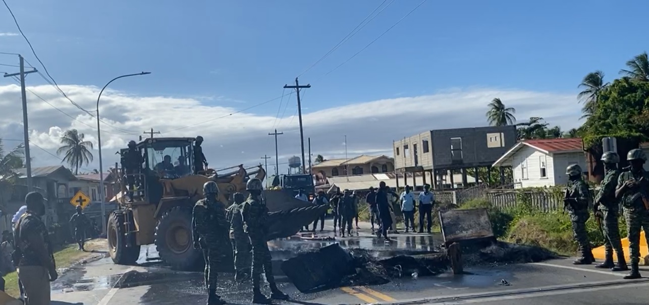 Soldiers deployed to support firefighters in clearing Buxton Public Road