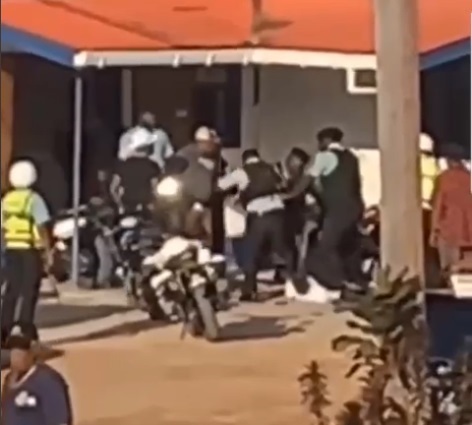 Video shows policeman kicking suspect in police station compound