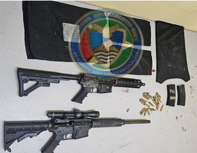Rifles, ammo, cocaine seized -CANU
