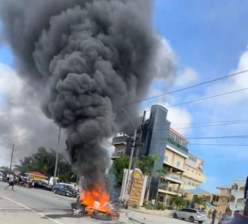 Angry persons burn tyres, storm Tuschen hotel for abducted girl; police say hotel was searched; car tracked down in West Bank Demerara