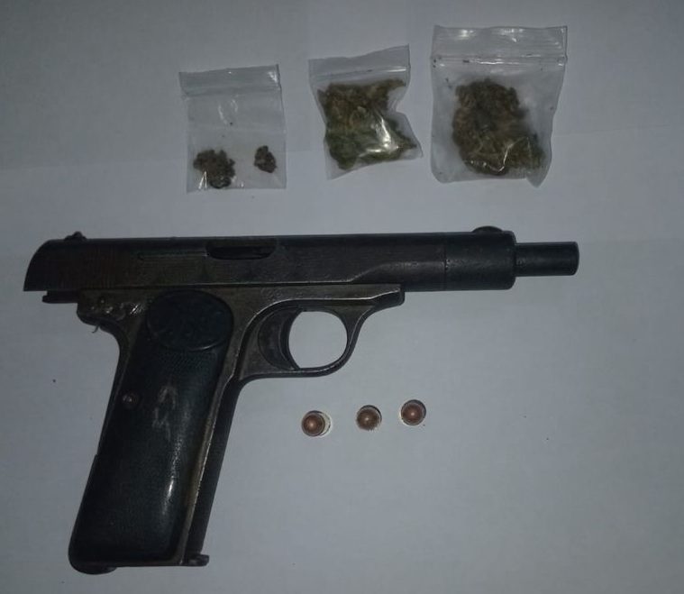 Firearm, suspected marijuana found